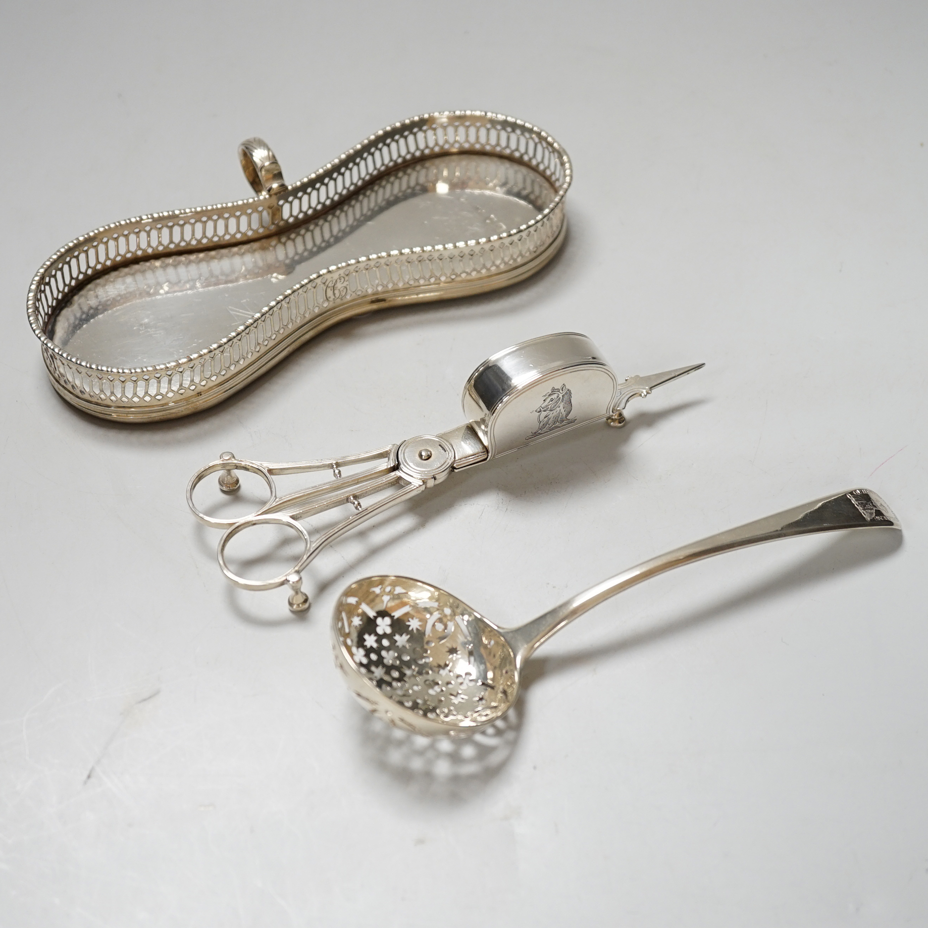 A pair of George III silver snuffers, maker William Bateman, London 1813, a George II sifter ladle and a snuffer's stand with wooden base, gross 328 grams